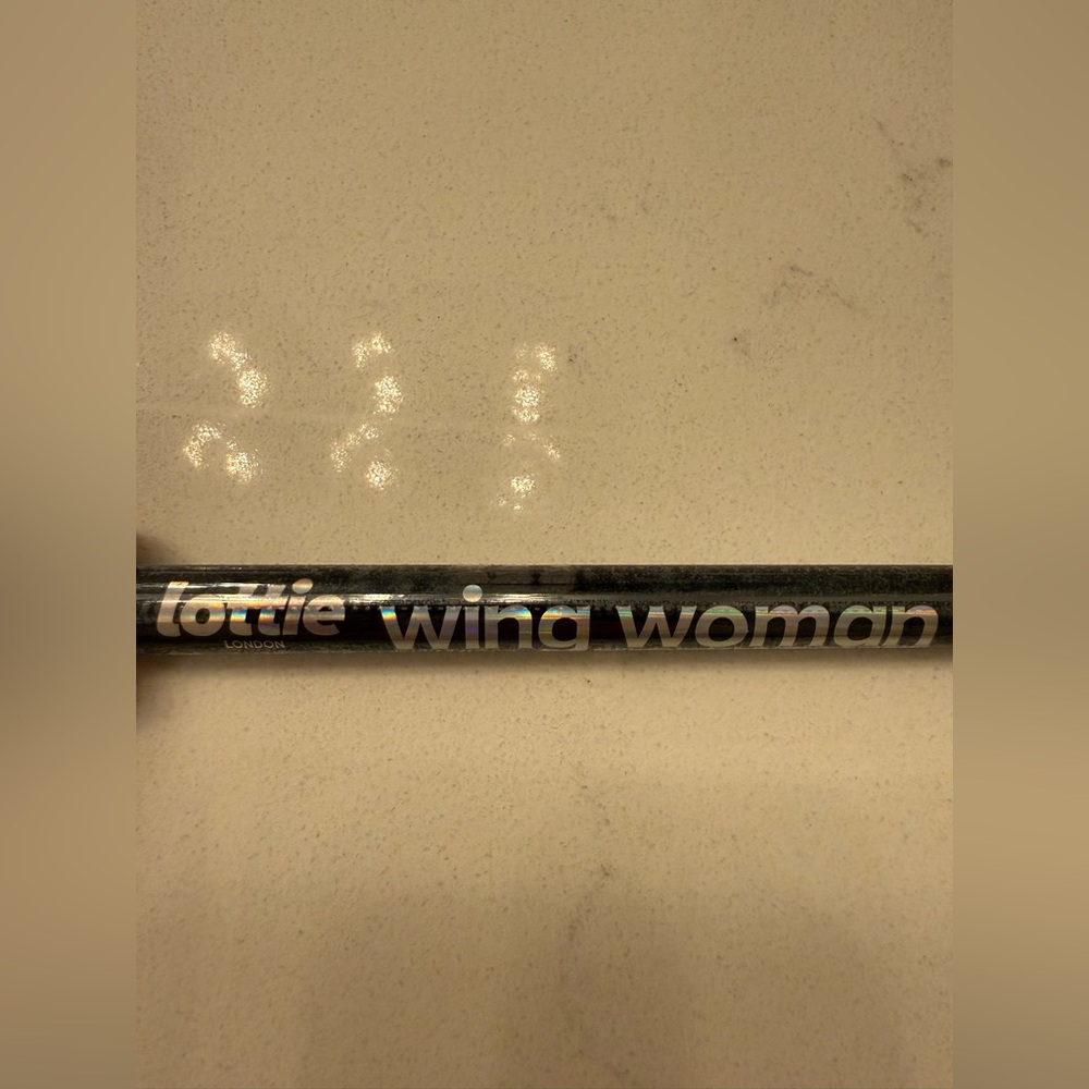 Lottie Black Wing Woman Eyeliner